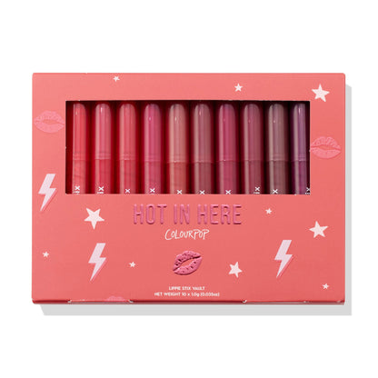 Heat Warning ColourPop Lippie Vault Set showcasing 10 Lippie Stix in gradient shades from bright coral and pink to berry and plum, arranged upright behind a clear window in a coral box labeled 'Hot In Here' with star and lightning graphics.